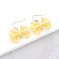 Yellow Shimmer Resin Bow Dangle Earrings